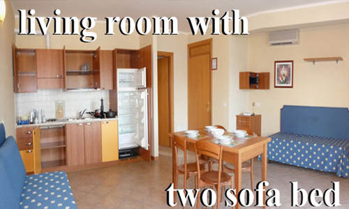 Holiday apartment in Manerba del Garda One bedroom with double bed, A living room with one or two sofa beds, Bathroom with shower box, Covered terrace, Lake view, with table, Linen and towels, Satellite TV, Air conditioning, Fully equipped kitchen, Private safe, Telephone